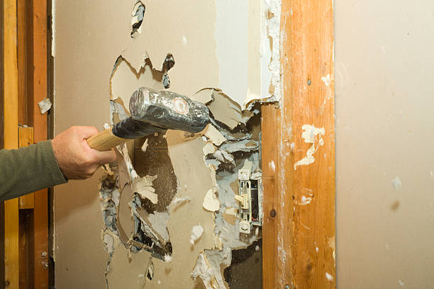 A sledge hammer is a great tool for removing unwanted drywall.